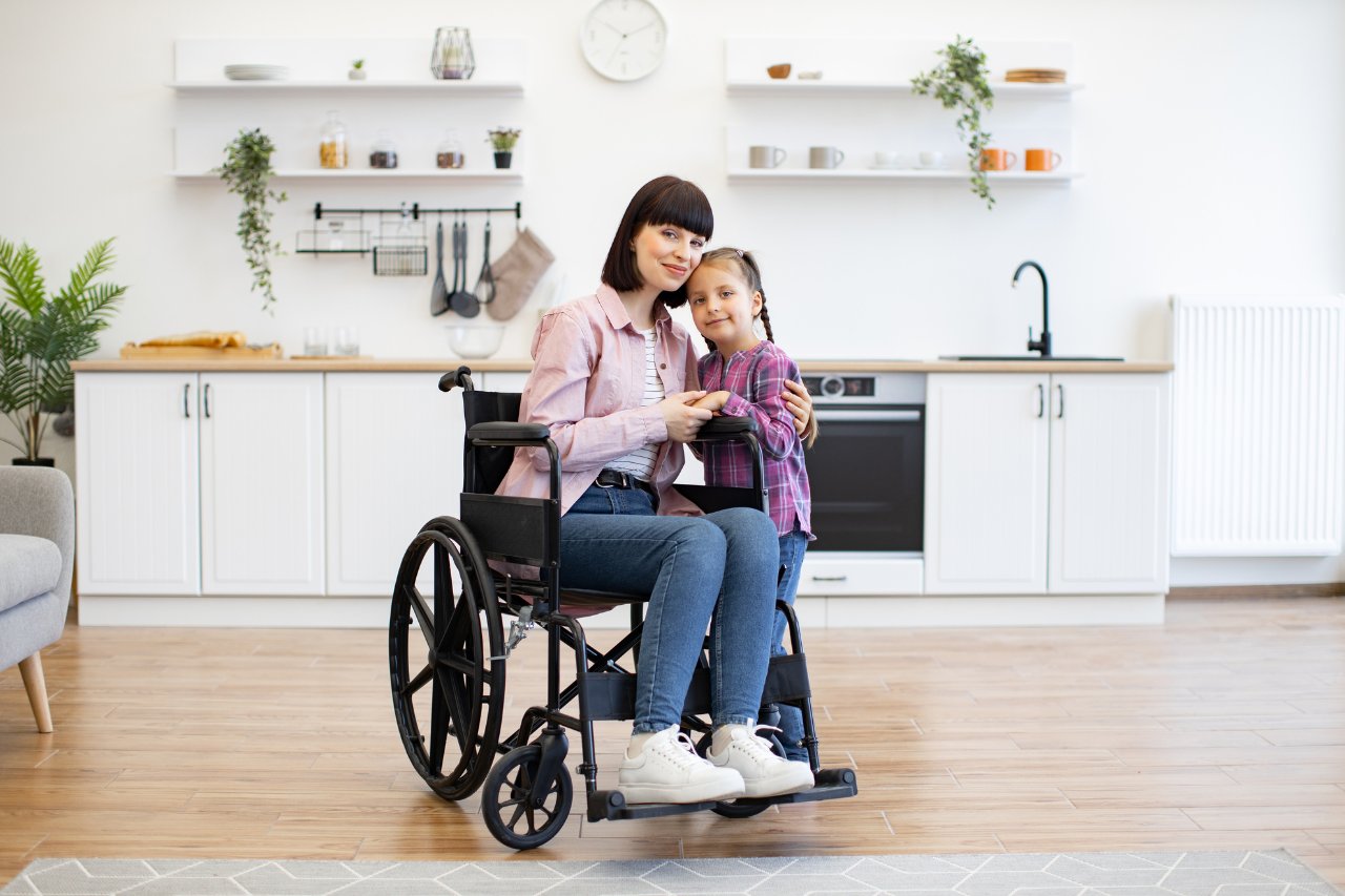 Allied health assistant guiding a participant through a therapy exercise